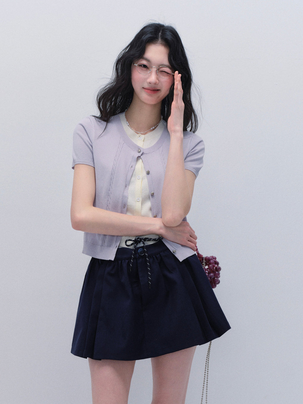 Faux Layered Knit Top And Double-Waist Mini Skirt