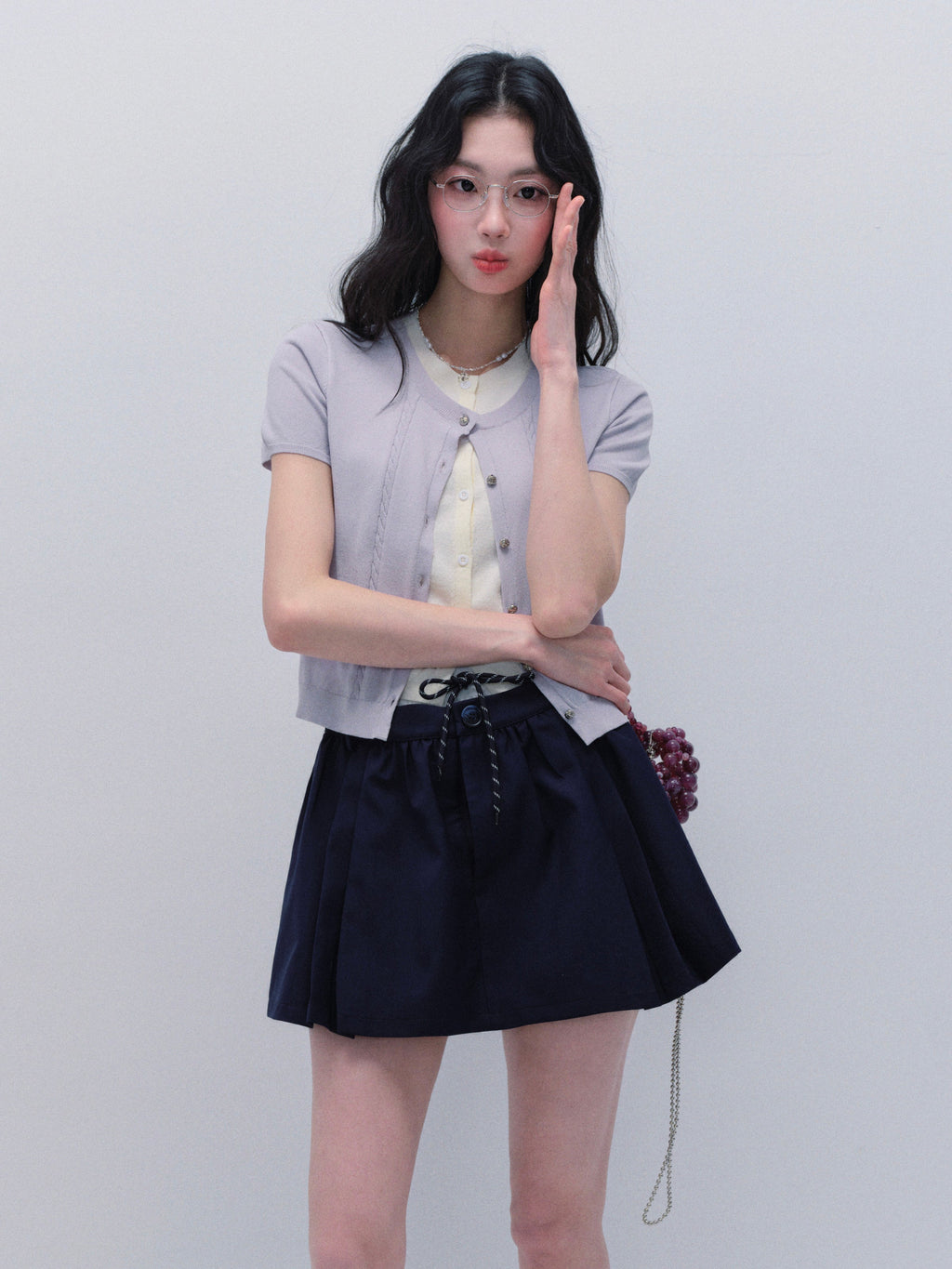 Faux Layered Knit Top And Double-Waist Mini Skirt