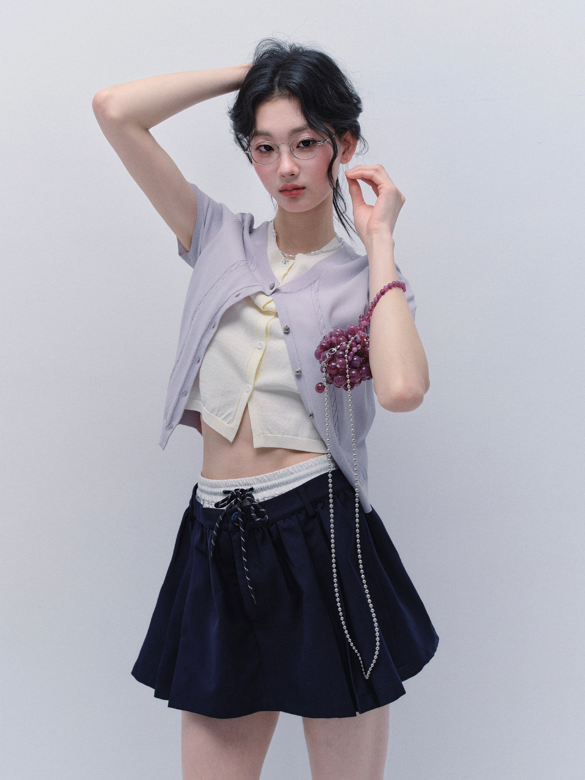 Faux Layered Knit Top And Double-Waist Mini Skirt