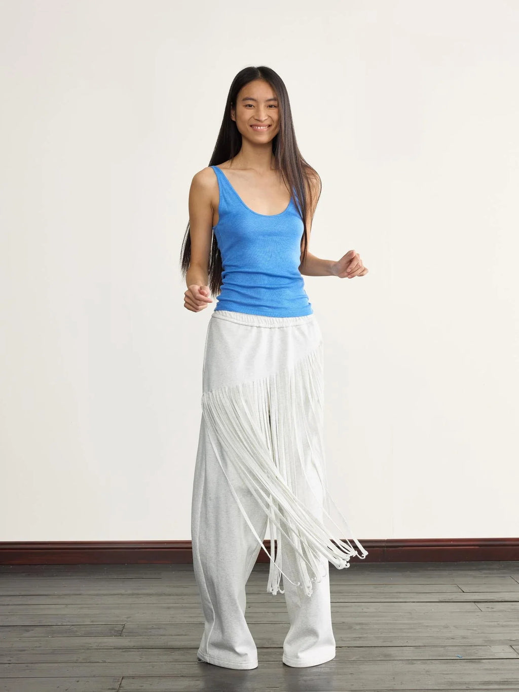 Fringed Knit Trousers With Cascading Layers