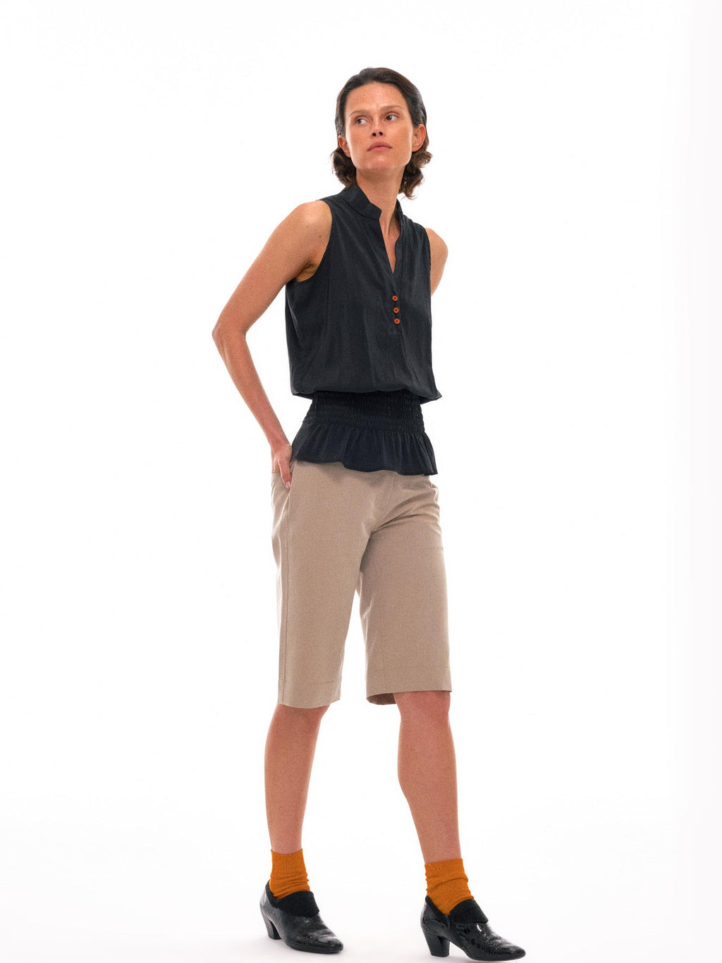 Sculpted V-Neck Vest with Peplum Hem