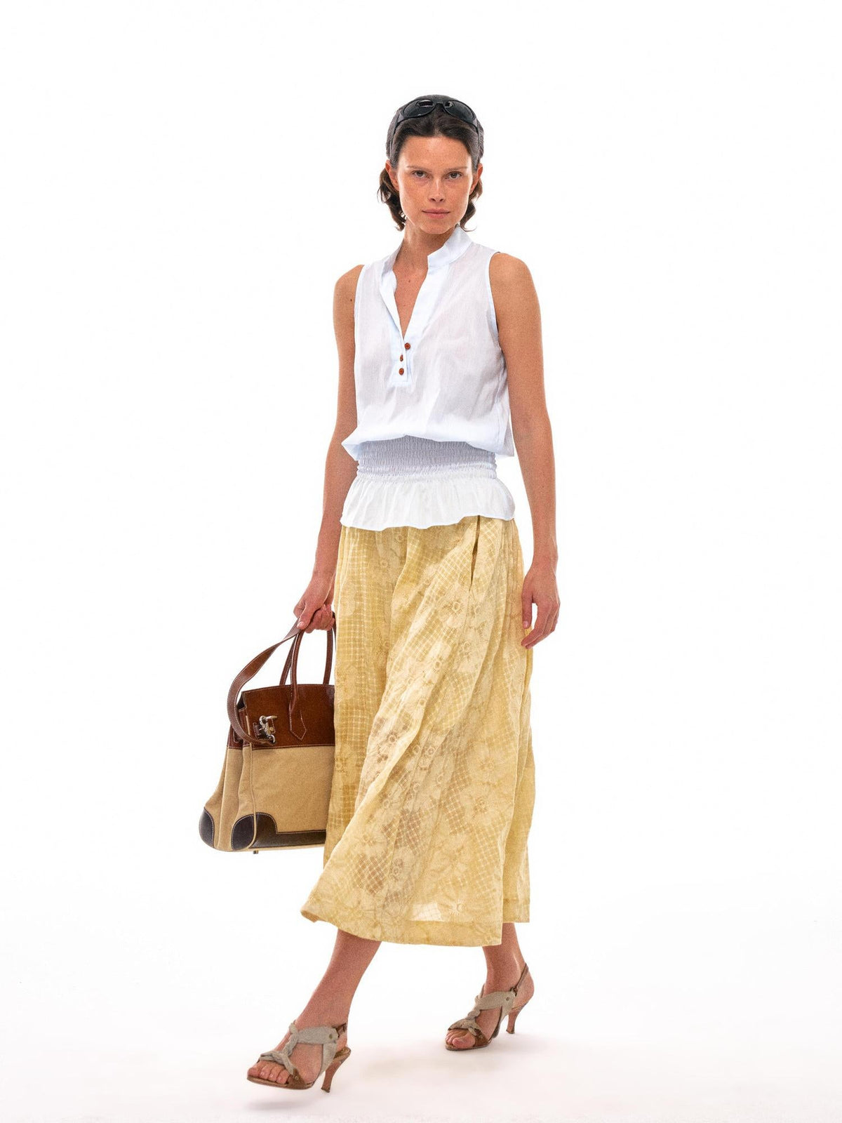 Sculpted V-Neck Vest with Peplum Hem