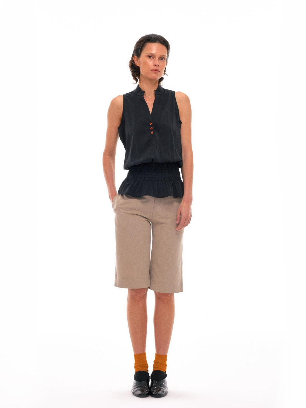 Sculpted V-Neck Vest with Peplum Hem