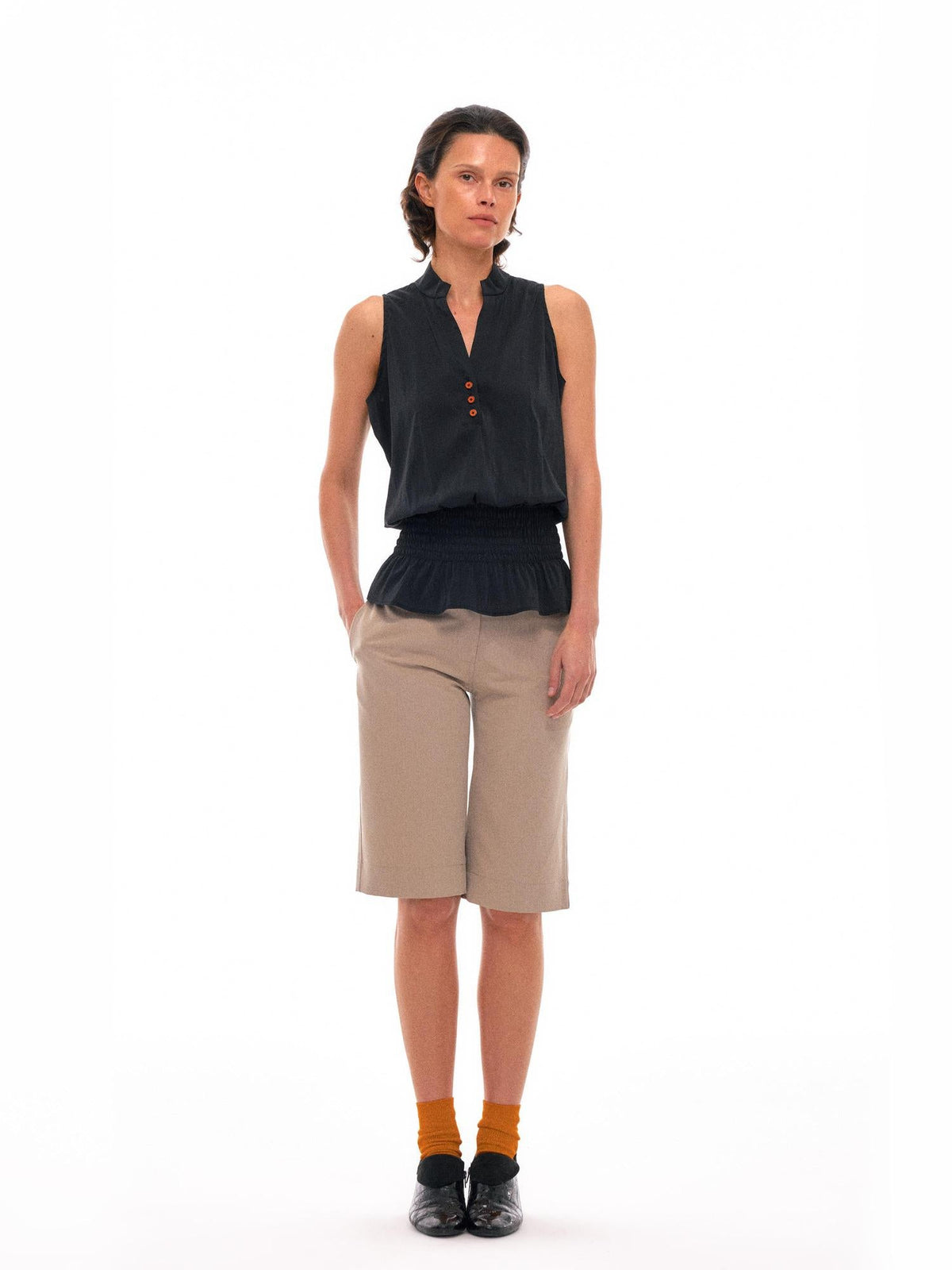 Sculpted V-Neck Vest with Peplum Hem