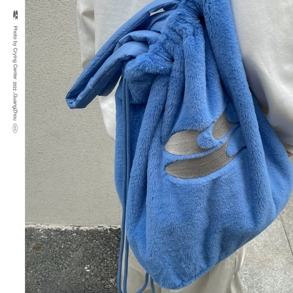 BLUE PLUSH DRAWSTRING BACKPACK