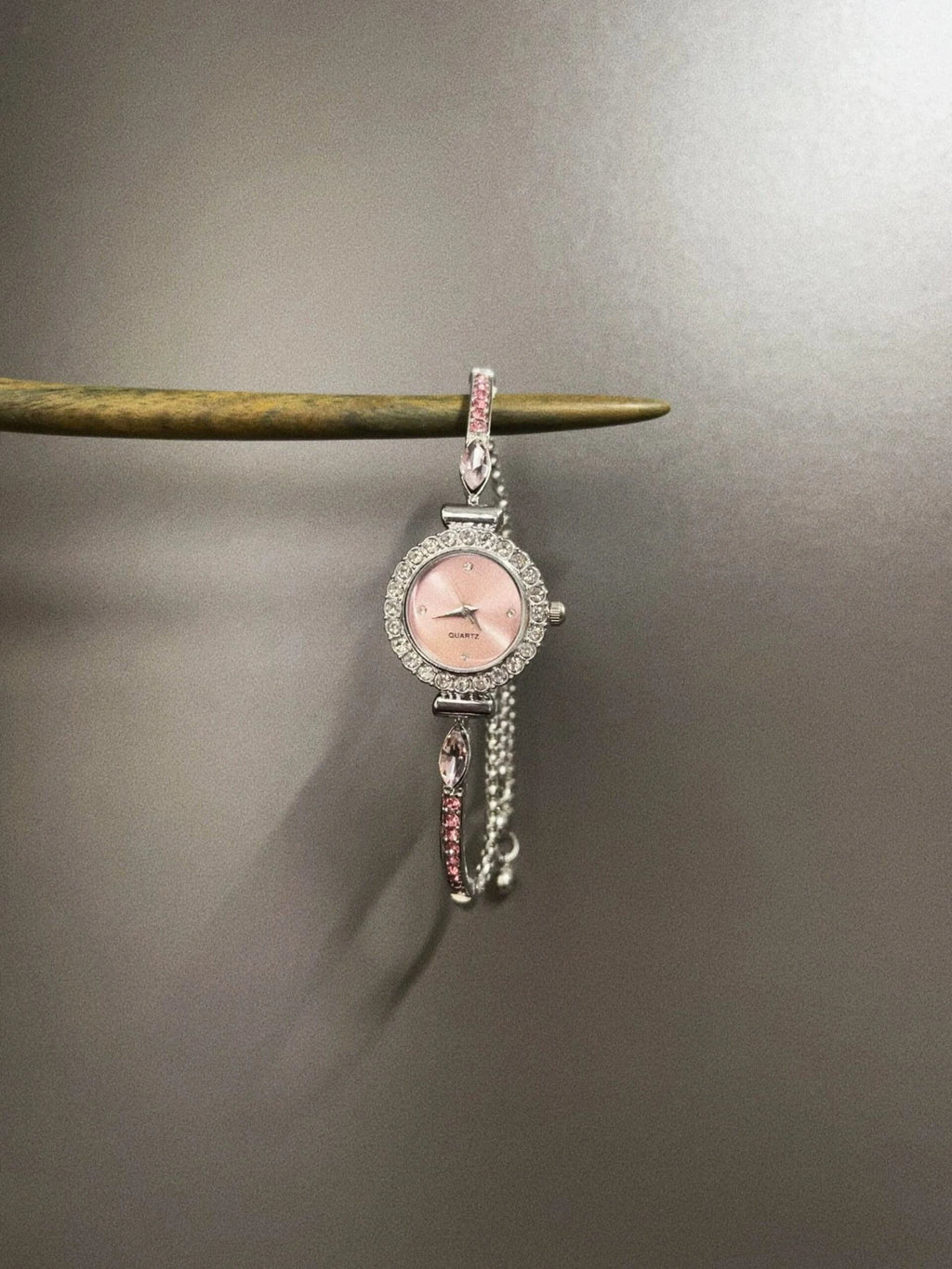 VINTAGE PINK BELTED CIRCLE WATCH