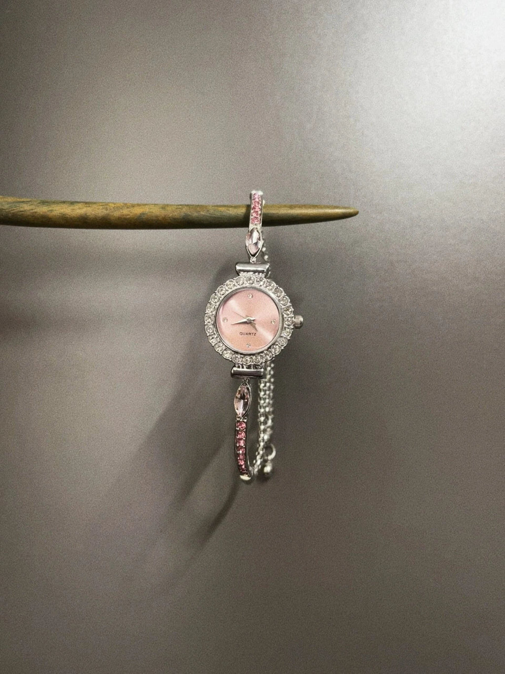 VINTAGE PINK BELTED CIRCLE WATCH
