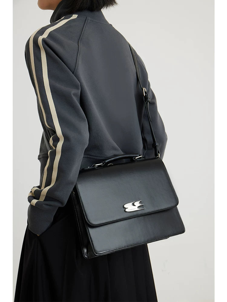 CRYING CENTER CLASSIC BRIEFCASE BACKPACK