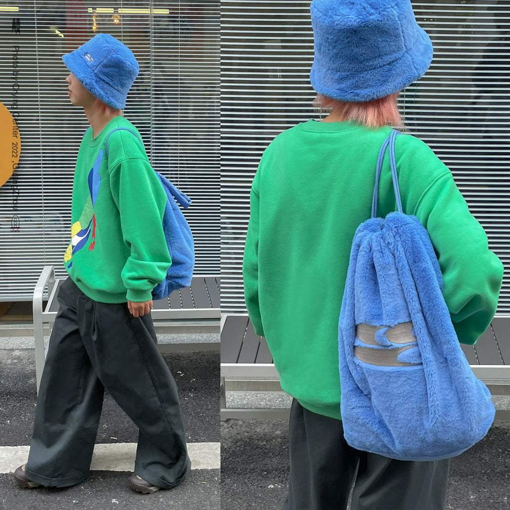 BLUE PLUSH DRAWSTRING BACKPACK